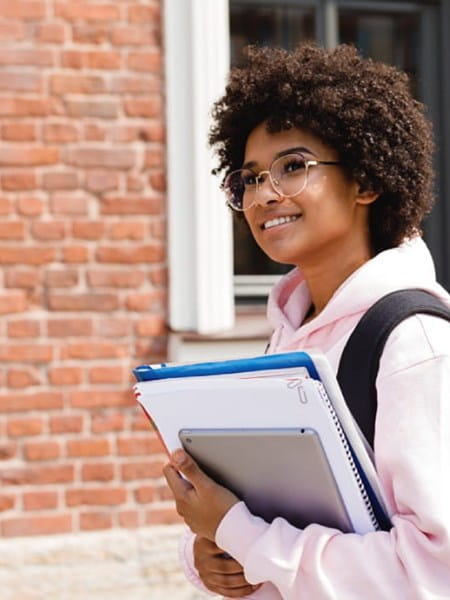 University student holding files