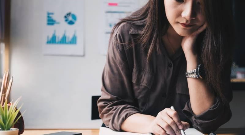 Young woman working on a document
