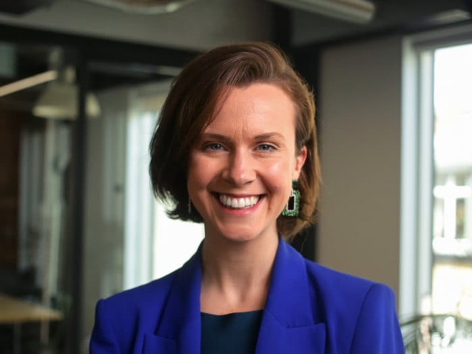 Corinne Thompson smiling in an office