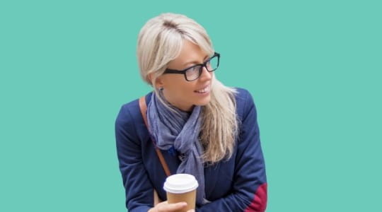 Young woman holding a coffee cup