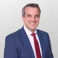 Headshot of Guy Vine