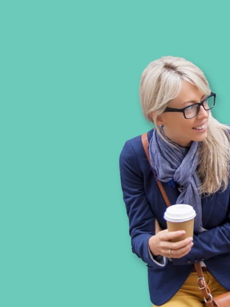 Young woman holding a coffee cup