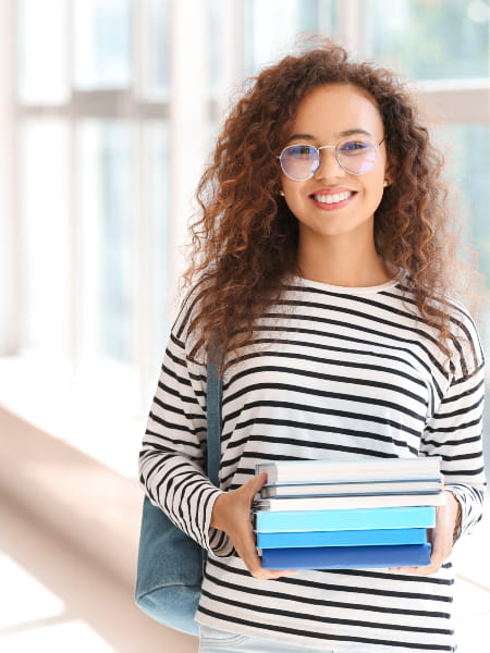 Student holding books
