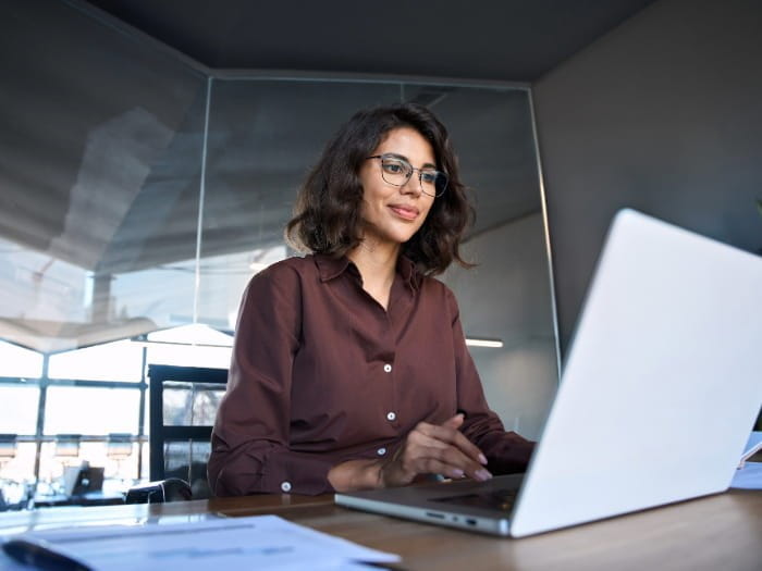 woman concentrating on laptop