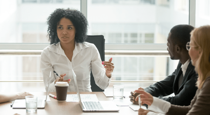 Black woman chairing meeting