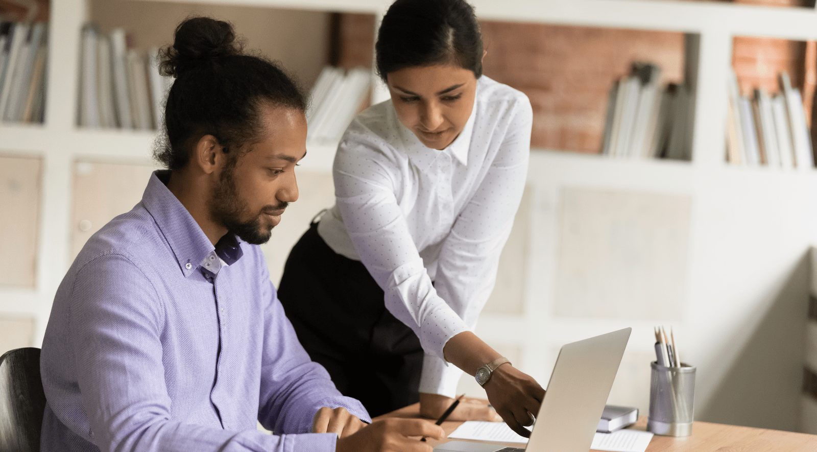 Audience of professional people applauding a speaker