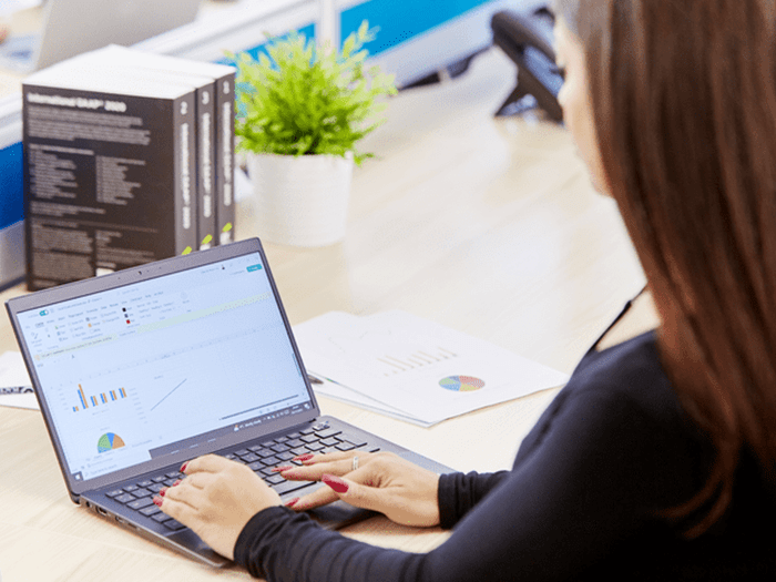 woman looking at laptop